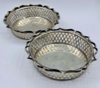 A Pair of lattice pattern pierced silver bonbon dishes, marked silver