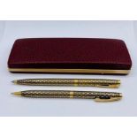 A cased set of Sheaffer 14ct gold GF (USA) pen and ball point pen set.