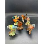 A selection of Beswick china birds and a Beswick Beagle (Largest 8cm H)