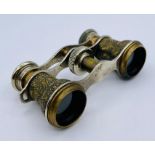 A pair of Vintage Opera glasses with Egyptian decoration.