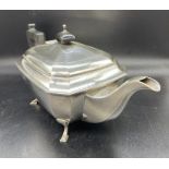 A silver teapot on four hoof feet, total weight 805g, hallmarked for Birmingham by A E Poston & Co