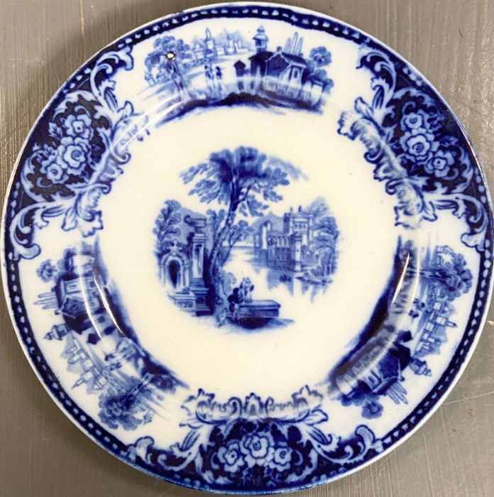 A large selection of blue and white platters, bowls, dishes and plates various makers