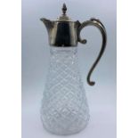 A Silver plate and cut glass decanter.