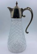A Silver plate and cut glass decanter.
