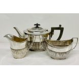 A WH & S Cross arrows tea service comprising teapot, sugar bowl and milk jug.