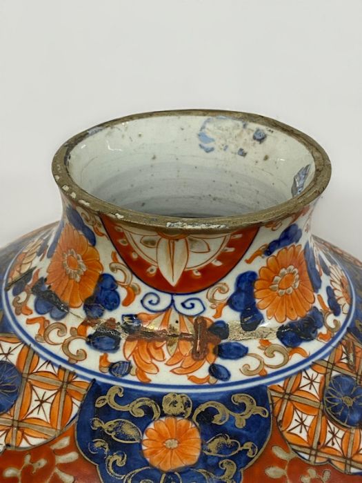 A Substantial 18th Century / 19th Century Imari vase with extensive repairs. - Image 3 of 9