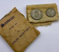 A Queen Elizabeth II Coronation commemorative shilling and sixpence in original packet.