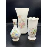 Three pieces of floral china vases by Aynsley and Royal Doulton