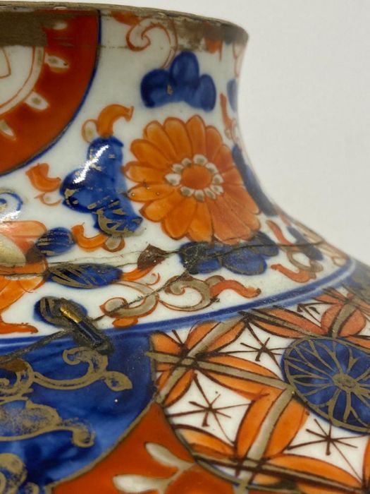 A Substantial 18th Century / 19th Century Imari vase with extensive repairs. - Image 9 of 9