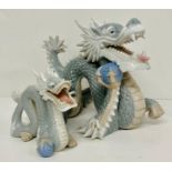 A selection of porcelain Dragon statue figures