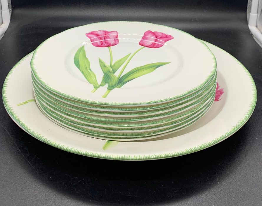 A selection of floral plates, eight plates and one larger one by Sally Crosthwaite for Carolyn