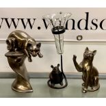 Two china cat figures and one mouse with a vase