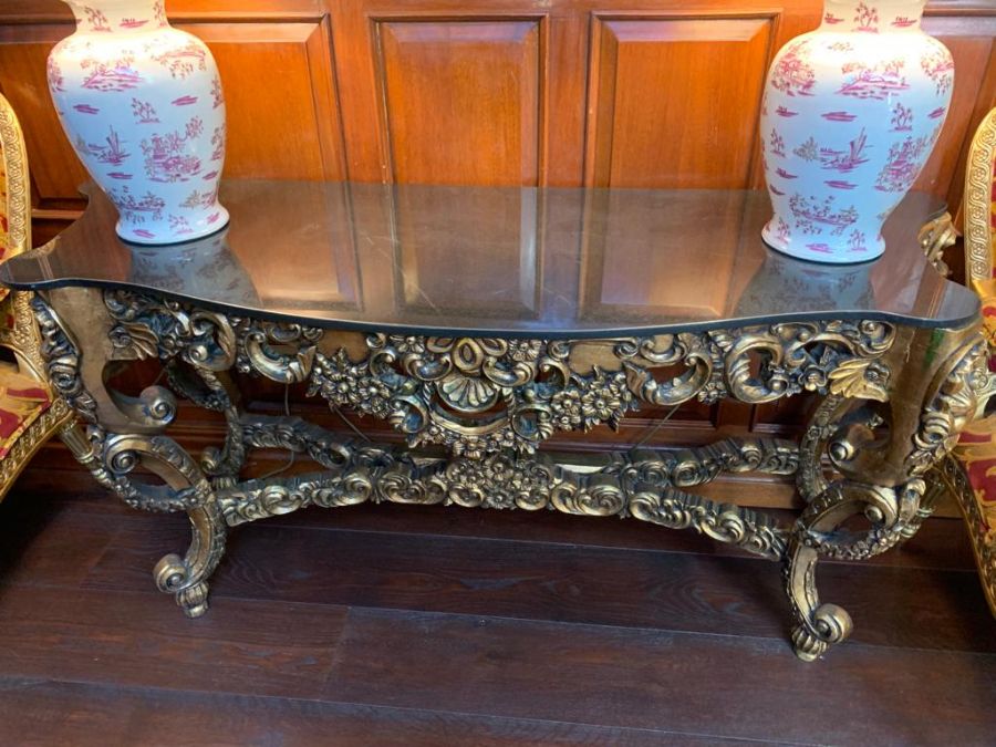 A French style marble topped table with decorative legs (147cm x 58cm x 78cm)