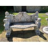 A substantial pair of marble ornate garden benches (160 cm w x 60 cm d x 95cm h) and a centre