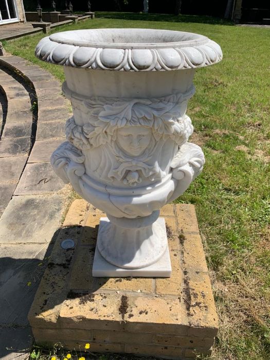 A Pair of marble urns with Rams heads 58cm d x 90cm h