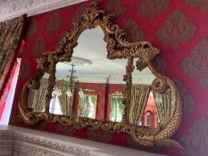 A Gilt framed over mantle mirror 110cm h x 150 cm wide