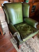 A Green wing back club chair (80cm w x 97cm h x seat height 44cm)