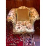 A Fabric covered wing arm chair with a monkey theme 94 cm wide x 86 cm high, seat height 44cm