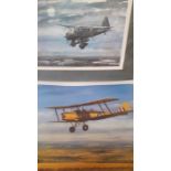 A pair of prints after E.A. Mills, "Early days", depicting a tiger moth biplane, signed and numbered