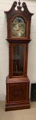 A Mahogany Long case clock, the case with scrolled pediment and turned wood finials