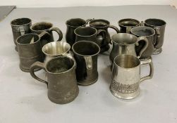 Fourteen half pint pewter vessels, various makers marks to include tankers, cider cups, etc