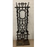 A cast iron bamboo style hall stand with original drip trays (H178cm D27cm)