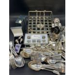 A selection of silver plated items to include cutlery