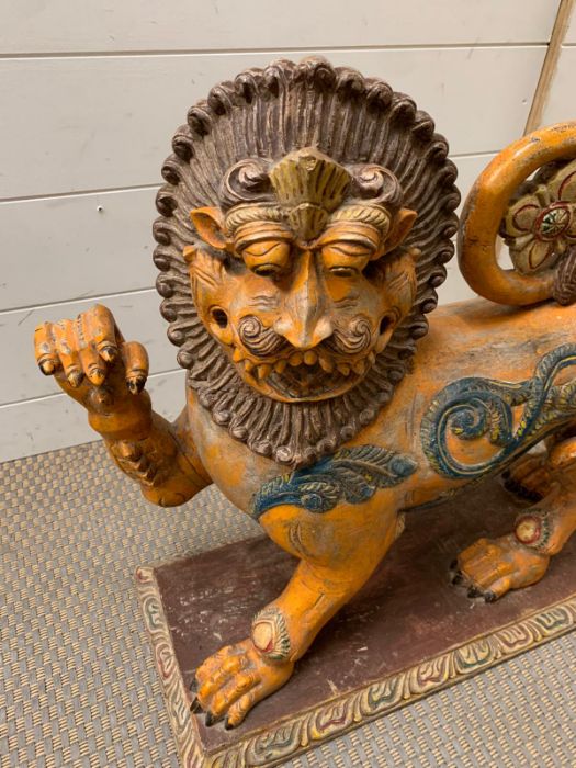 A Mythical lion carved in wood with upraised paw (H57cm W60cm) - Image 4 of 4