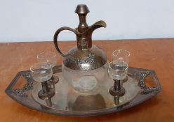 A continental Art Nouveau glass and silver plated integrated liqueur service for four, comprising