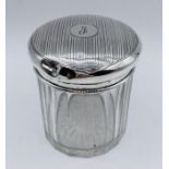 A Glass jar with hallmarked silver top for Birmingham