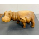 A carved wooden Hippo