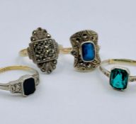 A Selection of four various rings marked 9ct gold and Silver.