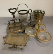 A selection of white metal and gilt centre pieces, wine bottle holders and vintage ice buckets