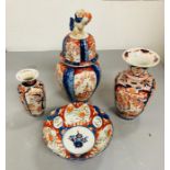 Three antique Japanese Imari style jars, one with cover and a similar fluted bowl, 21.5cm diameter