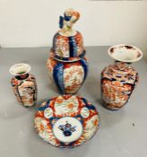 Three antique Japanese Imari style jars, one with cover and a similar fluted bowl, 21.5cm diameter