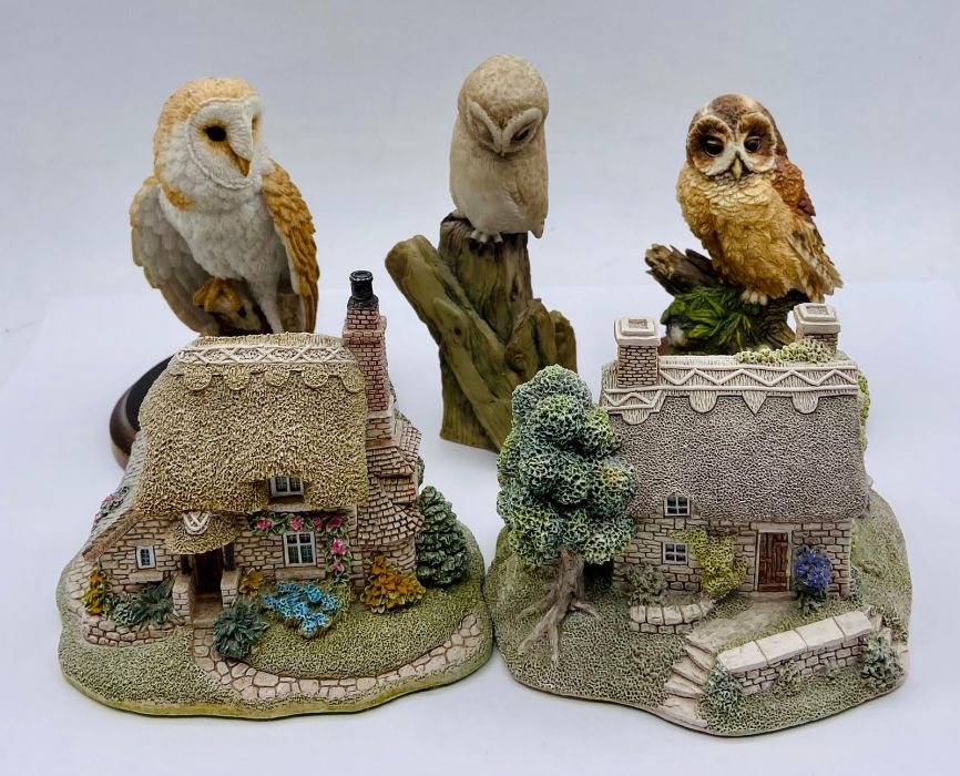 Two Lilliput Lane cottage and three owls.