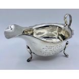 A silver, engraved sauce boat, hallmarked for Sheffield by Viner's Ltd (Emile Viner) 1939 (109g)