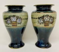 A pair of early 20th Century Lambeth Doulton stoneware vases by Bessie Newbery No 7998H.