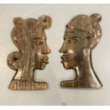 Two carved African head wall plaques