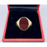 An 8ct yellow gold and blood stone