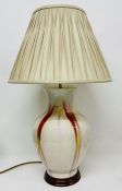 A china table lamp in the style of Moorcroft