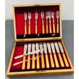 A boxed canteen of cutlery of silver plated cutlery