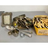 A selection of silver plated items to include cutlery, tray picture frame etc