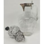 A silver plate fitted glass water jug and a glass grape shaped flask