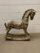 A wooden rocking horse (58cm x 50cm)
