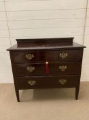 A Waring and Gillow three drawer chest of drawers (H84cm W92cm D46cm)