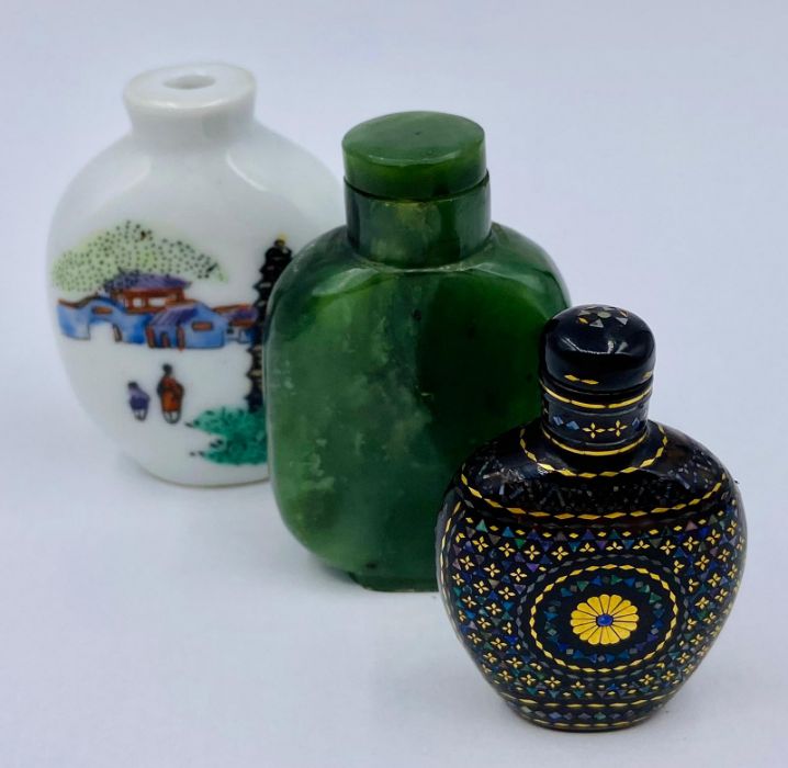 A collection of Chinese scent bottles in a wooden wall hanging display case. - Image 7 of 7