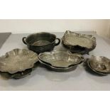A selection of various shapes and sizes pewter bowls, cake stands and trays