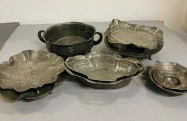 A selection of various shapes and sizes pewter bowls, cake stands and trays