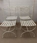 Four metal garden chairs